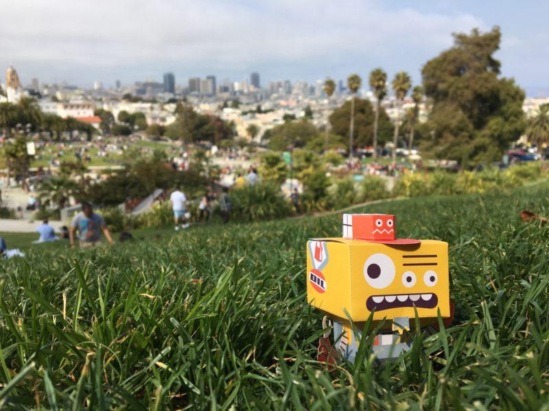 ERR-07 enjoying the view of the city from Dolores Park—before impressing friends with his signature grease burgers.