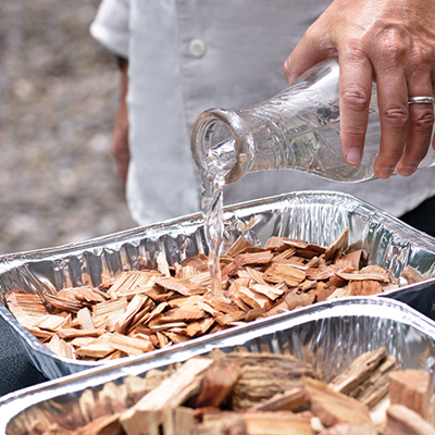 Soak the wood chips in water to cover prior to smoking.